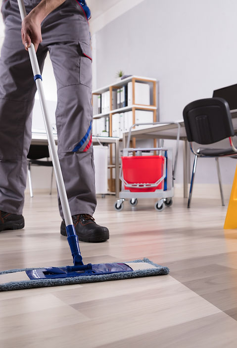 Majestic technician machine-polishing a commercial floor